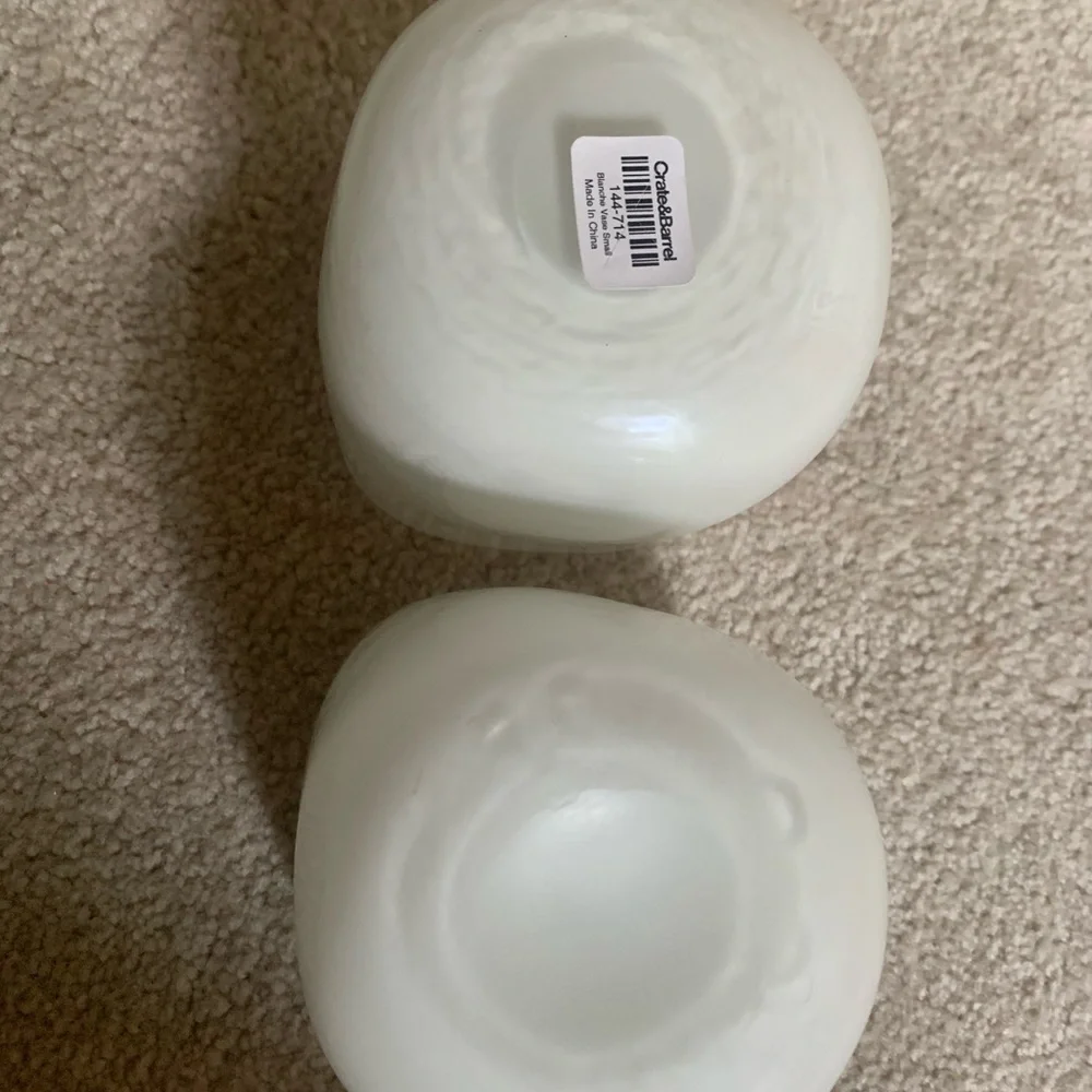 Two Crate & Barrel Creamy White Glasses / Candle Holders